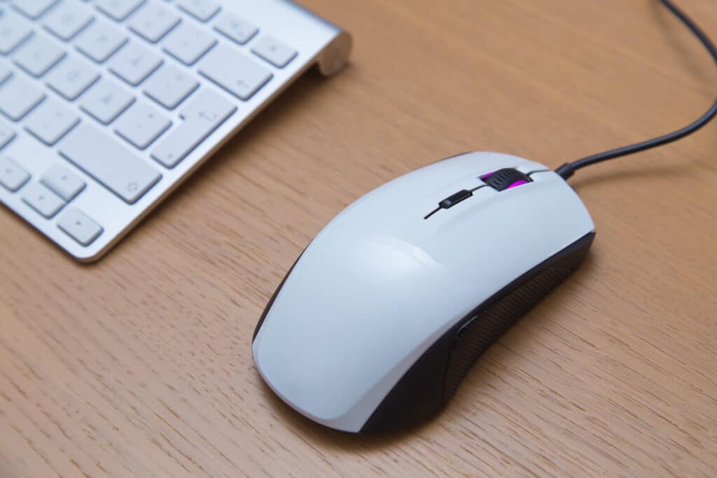 Gaming mouse and keyboard on desk working at office business
