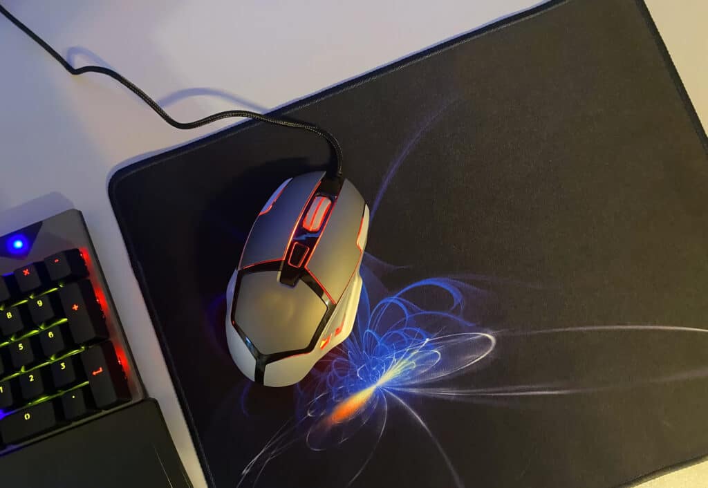 Computer mouse pad with RGB backlight. RGB illumination of a computer gaming mouse